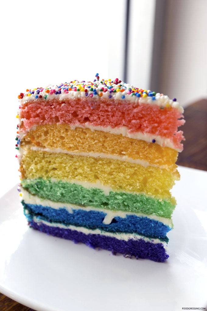Delicious Six Layer Rainbow Cake with Sprinkles