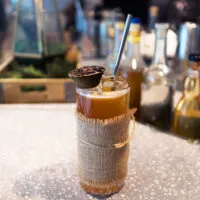 The Botanist Smoky Cocktail Fairmont Pacific Rim