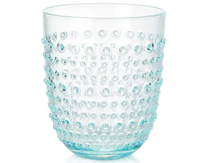 Dottie Aqua Acrylic Drink Glass at Crate and Barrel, $4.95. With its hip hobnail texture and distinctive shape, this aqua-colored acrylic glassware is ready to refresh at any casual indoor or outdoor gathering.