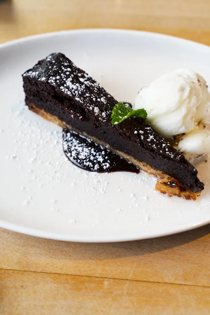 Mini Dark Chocolate Torte with toasted almonds and mint chocolate gelato Moxies Dine Out Vancouver 2021 Menu