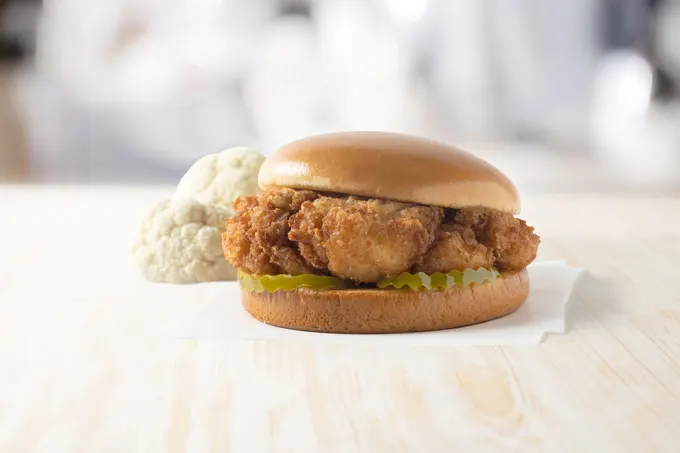 The company announced it will begin testing its first plant-forward entr&eacute;e, the Chick-fil-A Cauliflower Sandwich, at restaurants in three markets.
