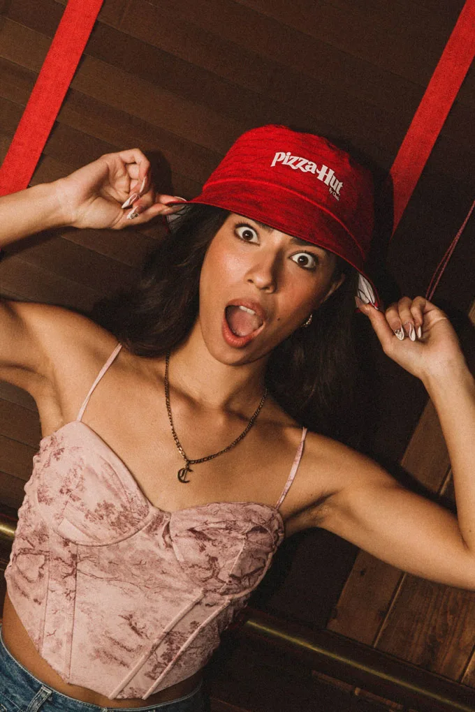 Pizza Hut Launches Limited-Edition Reversible "Hut Hat" in Partnership with Chain