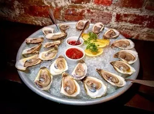 National Oyster Day Specials at Pando Park, Pando 39, Bar Marseille, and Bell Book & Candle