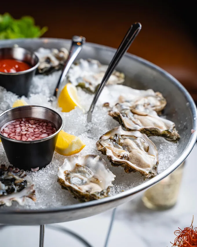 National Oyster Day Specials at Pando Park, Pando 39, Bar Marseille, and Bell Book & Candle