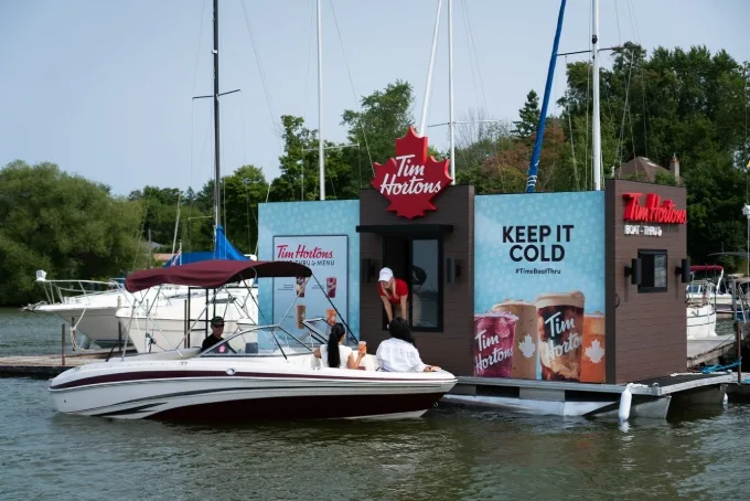 Tim Hortons opening its first-ever Boat-Thru for a limited time on Ontario's Lake Scugog, serving FREE cold beverages to guests who arrive by watercraft on Aug. 5-6