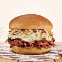 Firehouse Subs&reg; Transports Guests To Flavor Paradise With The Return Of The King's Hawaiian&reg; Pork & Slaw Sandwich After More Than Eight Years