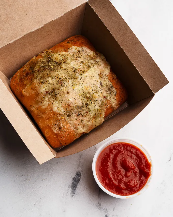 Tim Hortons Introduces New 3 Meat Hat-Trick Flatbread Pizza and Garlic Bread
