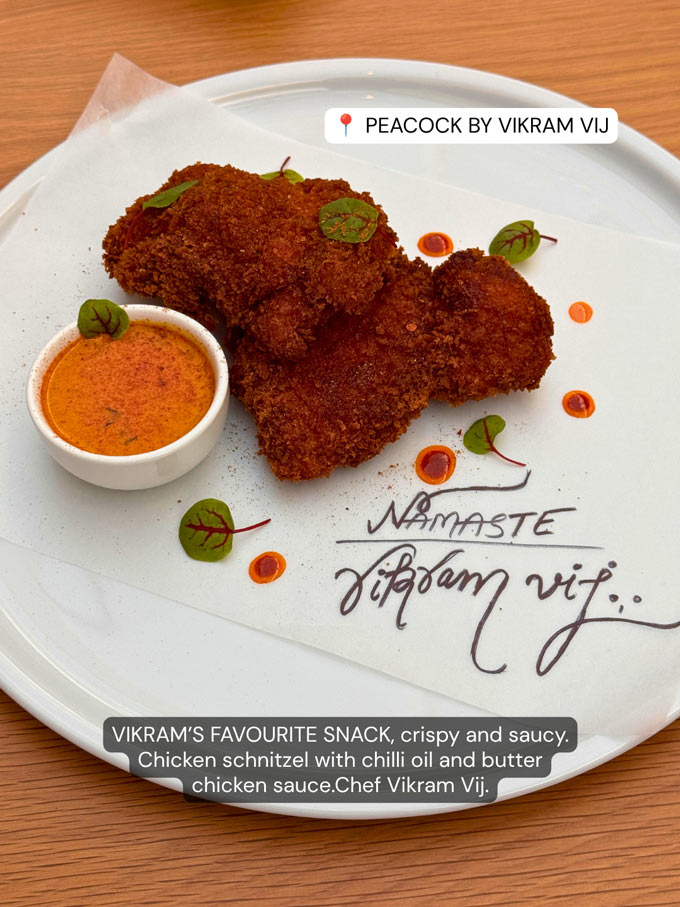 PEACOCK BY VIKRAM VIJ: Vikram’s Favourite Snack: Chicken schnitzel with chilli oil and butter chicken sauce.
